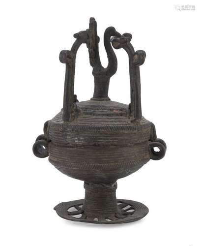 A SMALL AFRICAN BRONZE OIL LAMP EARLY 20TH CENTURY.