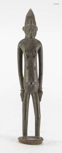 AN AFRICAN WOOD SCULPTURE DEPICTING ANCESTOR. 20TH CENTURY.