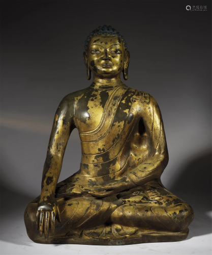 A LACQUER-GILT BRONZE OF BUDDHA SAKYA…