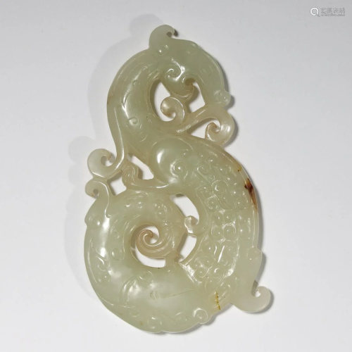 ARCHAIC CHINESE A CARVED WHITE JADE DRAGON