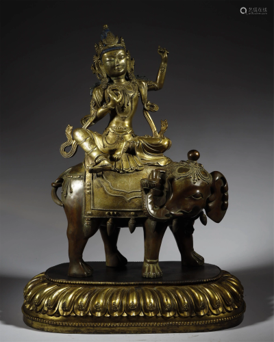 AN ARCHAIC GILT-BRONZE FIGURE OF BUDDHA…
