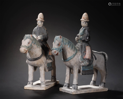 MING DYNASTY A PAIR PAINTED POTTERY FIGURE OF…