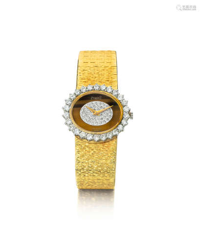 An 18k gold, diamond, and tiger's eye wristwatch,  PIAGET, VAN CLEEF & ARPELS