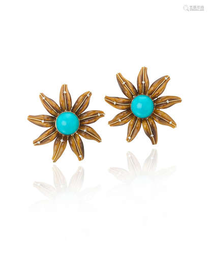 A pair of turquoise and Tiger's Eye ear clips