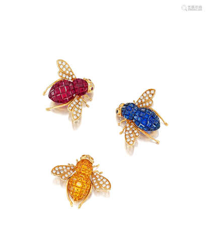 A trio of 18k gold, diamond and gem-set bee brooches