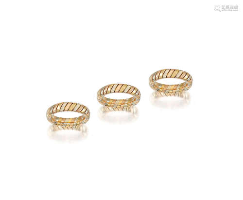 A Trio of 18k gold bands,  BULGARI