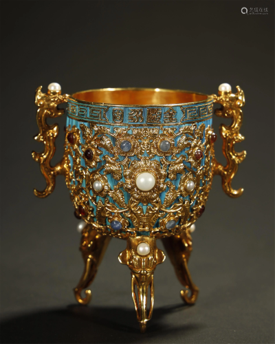 A GILT-BRONZE CUP AND GEMSTONE
