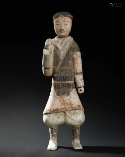 A LARGE PAINTED POTTERY FIGURE OF A WARRI…