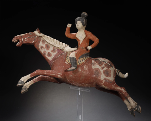 A LARGE PAINTED POTTERY POLO PLAYERS, TAN…