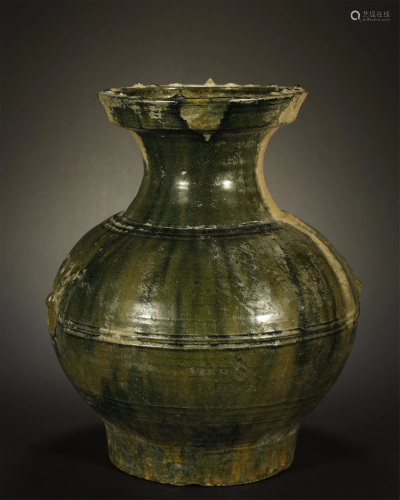 HAN DYNASTY A LARGE GREEN-GLAZED RED POTTERY…