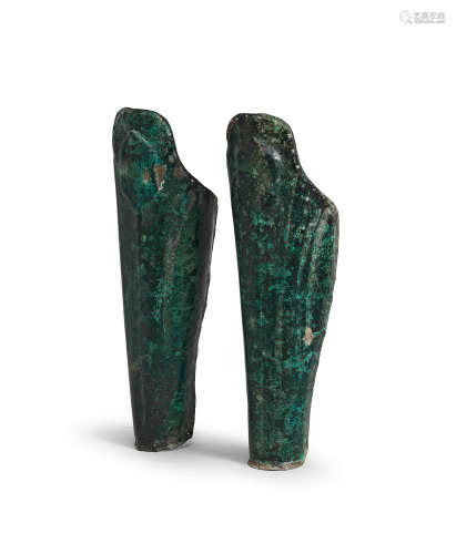 A pair of Greek bronze greaves  2
