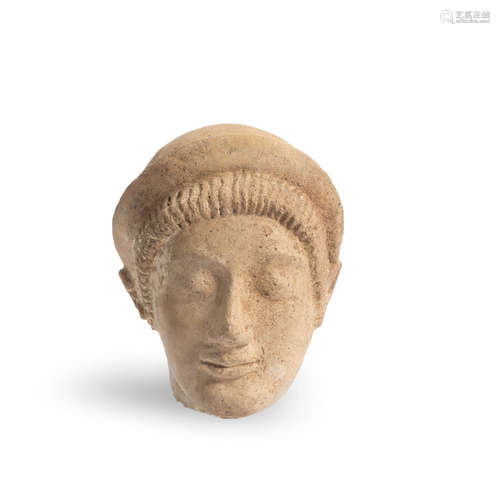 An Etruscan terracotta votive head