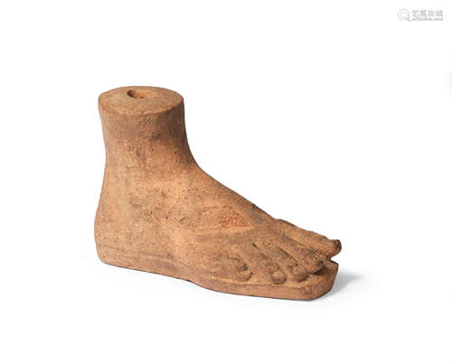 An Etruscan terracotta votive foot