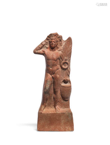 A Graeco-Egyptian terracotta figure of a victorious athlete