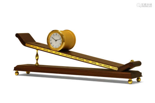 Imhof | A Rare Gilt Brass Incline Plane Clock, Circa 1970