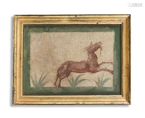 A Roman polychrome wall painting fragment