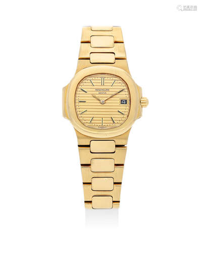 Patek Philippe | Nautilus Ref.4700/001, An Early and Rare Lady's Yellow Gold Bracelet Watch with Date, 1982