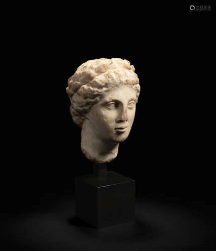 A Roman marble head of a muse