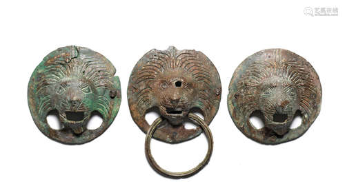 Three Roman bronze lion-headed handles  3