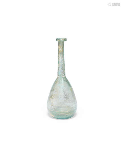 A Roman pale green glass flask