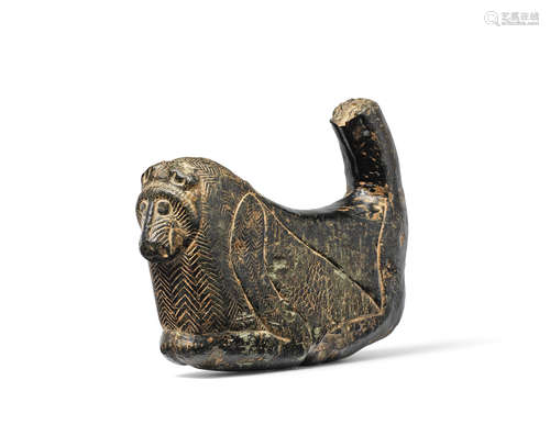 A Mesopotamian dark green steatite lion weight