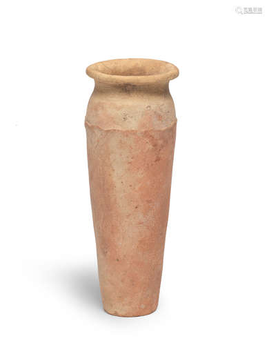 An Egyptian pottery wavy-handled jar