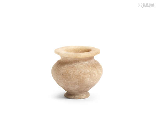 An Egyptian alabaster cosmetic jar