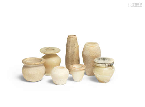 Seven Egyptian miniature alabaster vessels