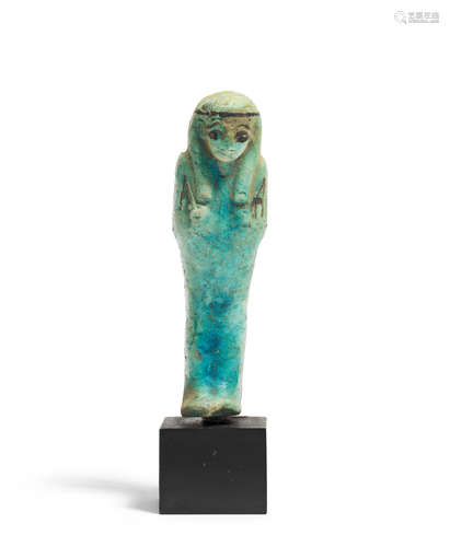 An Egyptian turquoise glazed composition shabti