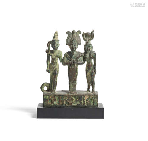 An Egyptian bronze triad sarcophagus