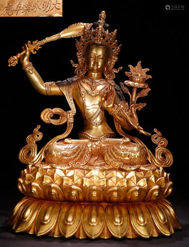 A GILT BRONZE CASTED MANJUSRI BUDDHA STATUE