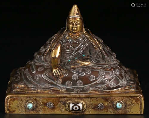 A TIBETAN GILT BRONZE WIHT SILVER TSONGKAHAPA STATUE