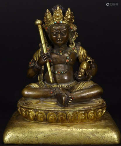 A GILT BRONZE WITH GEM DECORATED CAISHEN STATUE