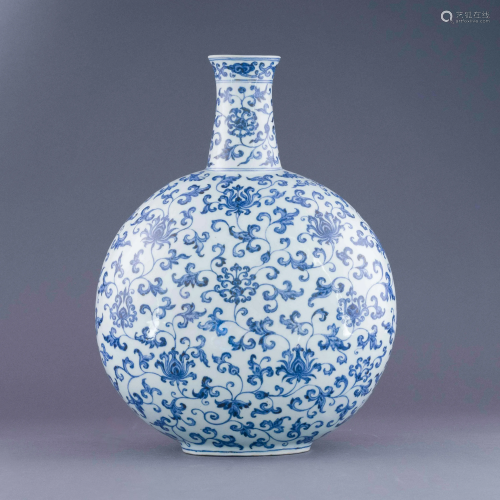 MING BLUE AND WHITE WRAPPED FLORAL MOON VASE