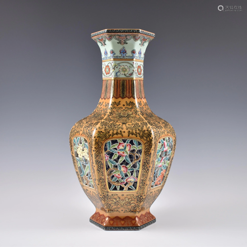 QIANLONG FAMILLE ROSE PIERCED PORCELAIN VA…