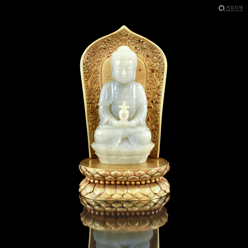 JADE CARVED BUDDHA ON GILT BRONZE AUREOLE …