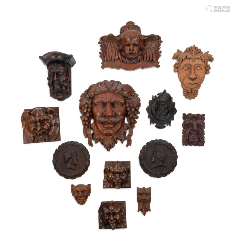 Thirteen Continental Carved Wood Masks
