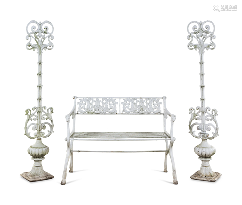 A White Painted Iron Garden Bench and a Pair of