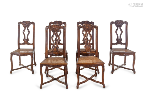 A Set of Six Italian Carved Oak Dining Chairs