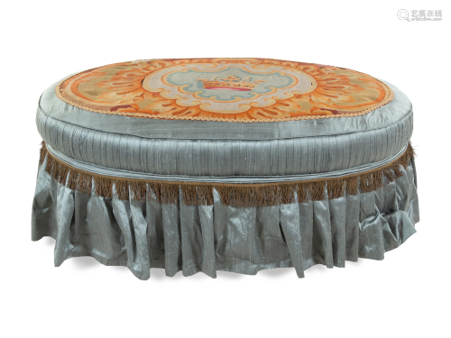 A French Needlepoint Upholstered Ottoman