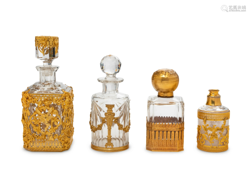 Four French Gilt Bronze Mounted Glass Bottles