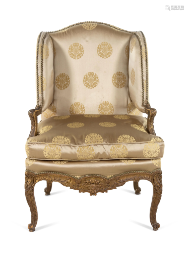A Louis XV Style Carved and Giltwood Fauteuil