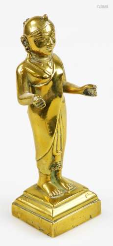 A 19thC cast brass figure of an Hindu goddess, 24cm high.