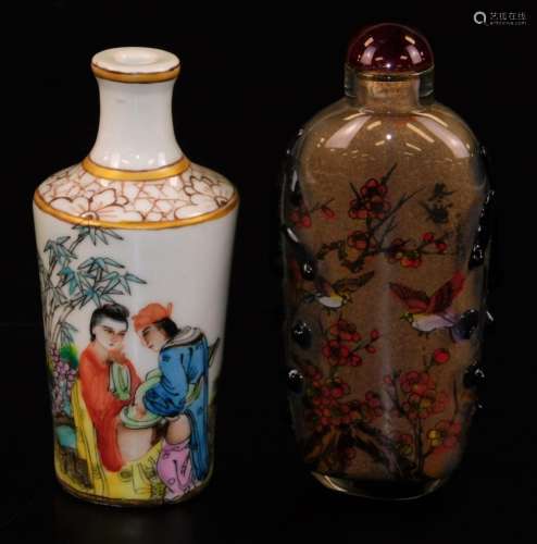 A Chinese porcelain snuff bottle, of shouldered cylindrical form decorated with figures in