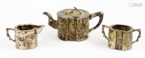 An early 20thC Chinese silver three piece service, comprising teapot, two handled sugar bowl and