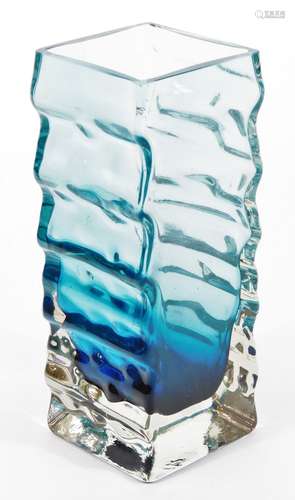 A Finnish glass vase by Henrik Koivula, with a blue tint over clear ribbed side, on square