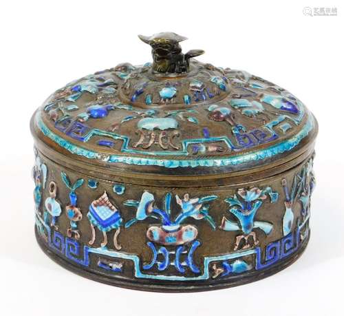 A Chinese enamel on copper box and cover, of circular form, heavily decorated with raised flowers in