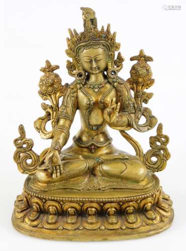 A Sino-Tibetan gilt bronze figure of White Tara, the Goddess of Compassion, in seated pose