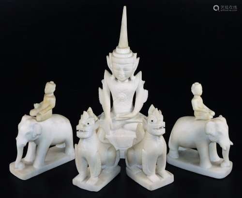 Carved stone figures, of temple lions, elephants and Hindu Goddess, the tallest 33cm. (5)