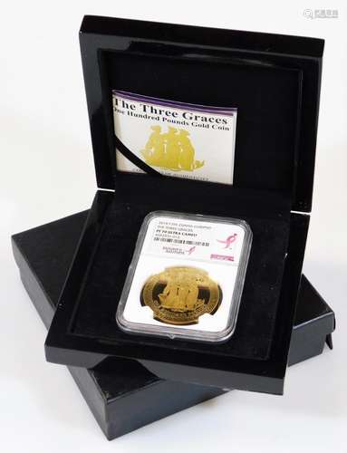 A Three Graces one hundred pound gold coin, with paperwork reading 2015 .999 gold 1oz, in outer case